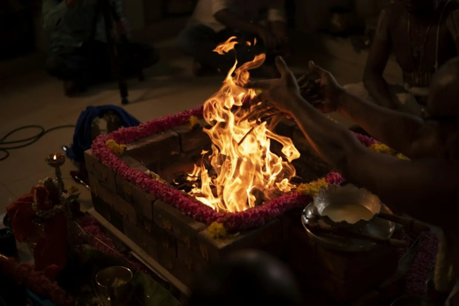 Pandit Ji conducting a traditional havan